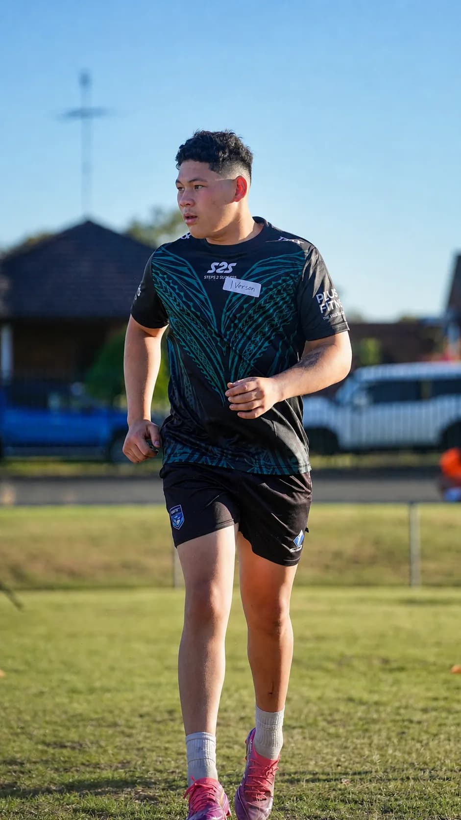 S2S player wearing a day-one name tag at training